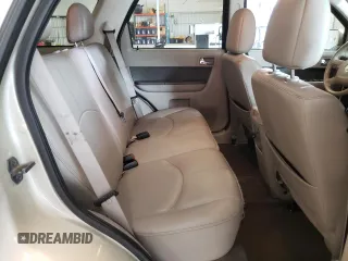 2011 Mercury Mariner Premier z VIN 4M2CN9HG9BKJ06775, wystawiony jako Copart lot #59256315 z przebiegiem 186 694 mil mil oraz Szkoda całkowita • Salvage title. Historia ofert i sprzedaży dostępna na DreamBid. Obrazek 11.