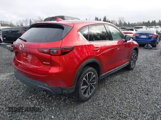 2023 Mazda CX-5 2.5 S Premium Package with VIN JM3KFBDM1P0161605, listed as a IAAI auction lot 41626777 with 26,581 mi miles. Bid and sale history available at carsss.com. Image 4.