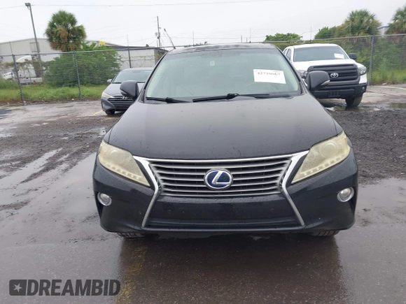 2013 Lexus RX 450h with VIN JTJZB1BA3D2006802, listed as a IAAI auction lot 42720067 with 117,291 mi miles and . Bid and sale history available at DreamBid. Image 6.