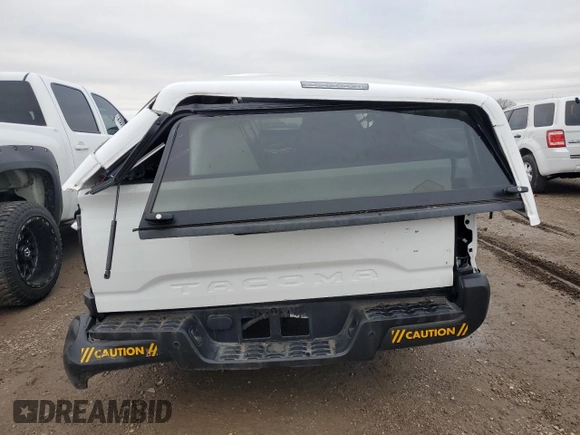 2023 Toyota Tacoma SR z VIN 3TYRX5GN6PT079381, wystawiony jako Copart lot #81633904 z przebiegiem 20 315 mil mil oraz Szkoda całkowita • Salvage title. Historia ofert i sprzedaży dostępna na DreamBid. Obrazek 6.