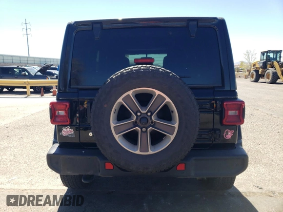 2020 Jeep Wrangler Unlimited Sahara with VIN 1C4HJXEGXLW209908, listed as a Copart auction lot 49409625 with 73,352 mi miles and Salvage title. Bid and sale history available at DreamBid. Image 6.