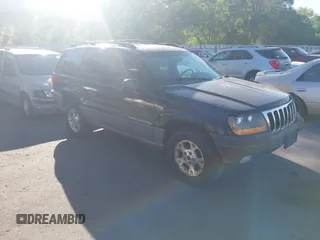 1999 Jeep Grand Cherokee Laredo with VIN 1J4GW58S0XC538913, listed as a IAAI auction lot 42684467 with 241,252 mi miles and . Bid and sale history available at DreamBid. Image 1.
