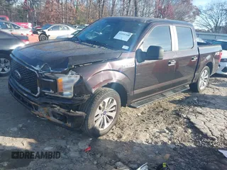 2018 Ford F-150 XL with VIN 1FTEW1C50JFA26307, listed as a IAAI auction lot 41091268 with 129,012 mi miles and . Bid and sale history available at DreamBid. Image 2.