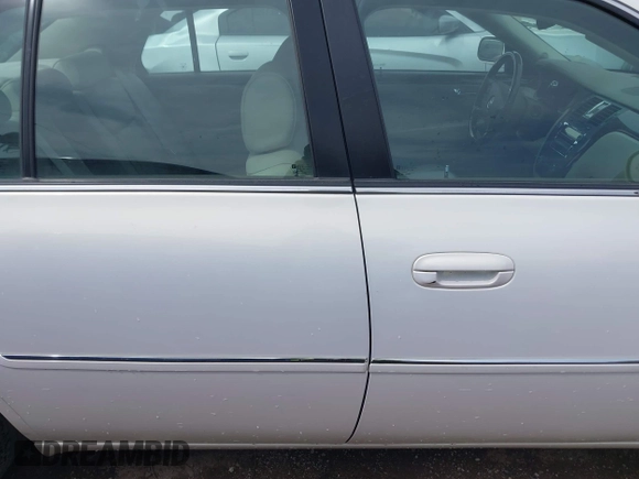 2006 Cadillac DTS w/1SC with VIN 1G6KD57YX6U159151, listed as a IAAI auction lot 42039862 with 45,729 mi miles. Bid and sale history available at carsss.com. Image 13.