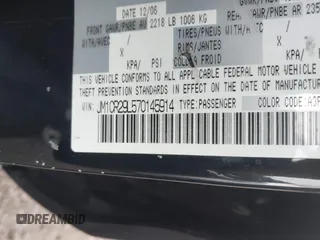 2007 Mazda 5 Touring with VIN JM1CR29L570145914, listed as a IAAI auction lot 41384247 with Not provided miles and . Bid and sale history available at DreamBid. Image 9.