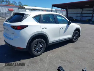 2020 Mazda CX-5 Sport with VIN JM3KFABM9L0828959, listed as a IAAI auction lot 41814085 with 15,344 mi miles. Bid and sale history available at carsss.com. Image 4.