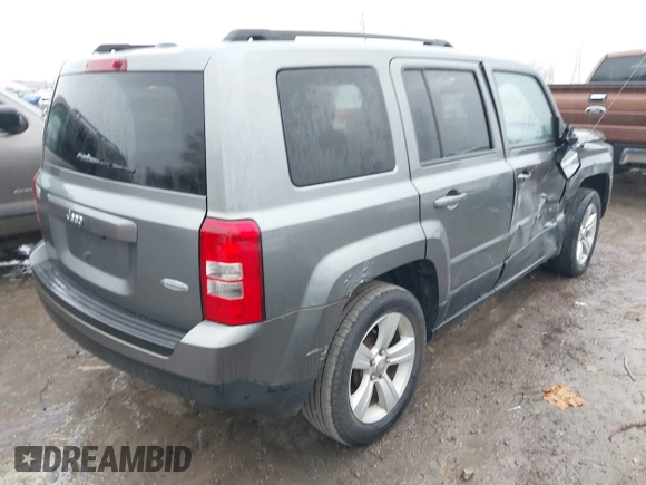 2013 Jeep Patriot Latitude with VIN 1C4NJPFB8DD129848, listed as a IAAI auction lot 40949386 with 168,839 mi miles and . Bid and sale history available at carsss.com. Image 4.