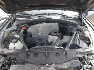 2015 BMW 5 Series 528i with VIN WBA5A5C58FD520694, listed as a IAAI auction lot 41804906 with 121,636 mi miles. Bid and sale history available at carsss.com. Image 10.