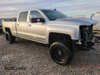 2015 Chevrolet Silverado 3500HD LTZ with VIN 1GC4K0E82FF634054, listed as a Copart auction lot 85249714 with 121,703 mi miles and Salvage Title. Bid and sale history available at carsss.com. Image 4.