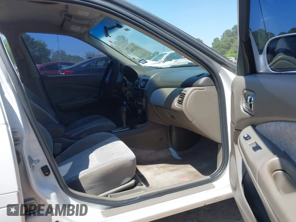 2003 Nissan Sentra XE with VIN 3N1CB51D13L775682, listed as a IAAI auction lot 42039084 with 136,851 mi miles and . Bid and sale history available at DreamBid. Image 5.