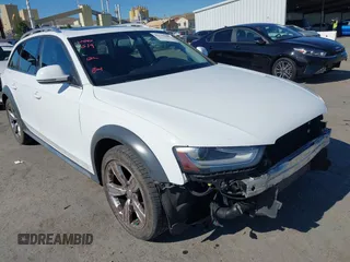 2014 Audi allroad A4 Premium Plus z VIN WA1UFAFL6EA011510, wystawiony jako IAAI lot #42227389 z przebiegiem 113 690 mil mil oraz . Historia ofert i sprzedaży dostępna na DreamBid. Obrazek 1.