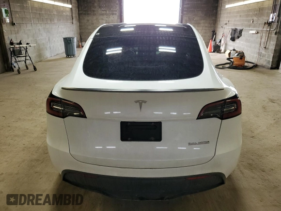 2023 Tesla Model Y Performance z VIN 7SAYGDEF6PF798103, wystawiony jako Copart lot #53607895 z przebiegiem 22 334 mil mil oraz Szkoda całkowita • Salvage title. Historia ofert i sprzedaży dostępna na DreamBid. Obrazek 6.