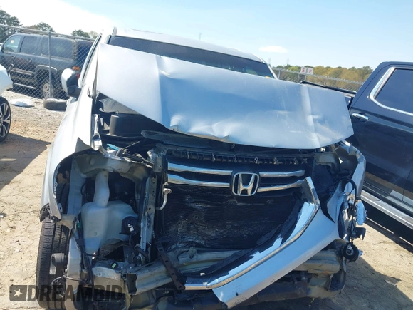 2013 Honda Pilot EX-L with VIN 5FNYF3H59DB022797, listed as a IAAI auction lot 41880675 with 206,359 mi miles and . Bid and sale history available at DreamBid. Image 12.