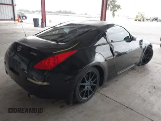 2007 Nissan 350Z Touring z VIN JN1BZ34E07M551167, wystawiony jako IAAI lot #40756114 z przebiegiem 153 353 mil mil oraz . Historia ofert i sprzedaży dostępna na DreamBid. Obrazek 4.