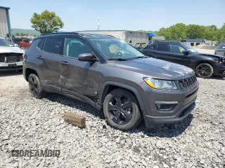 2019 Jeep Compass Altitude with VIN 3C4NJDBB0KT683557, listed as a Copart auction lot 59211055 with 102,648 mi miles and Salvage title. Bid and sale history available at DreamBid. Image 4.