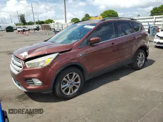 2018 Ford Escape SE z VIN 1FMCU9GD6JUC27200, wystawiony jako Copart lot #58787375 z przebiegiem Nie podano mil oraz Czysty tytuł • Clean title. Historia ofert i sprzedaży dostępna na DreamBid. Obrazek 1.