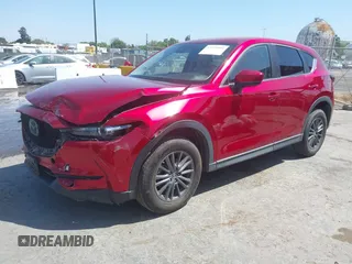 2019 Mazda CX-5 Touring with VIN JM3KFACM5K1516242, listed as a IAAI auction lot 42019803 with 113,953 mi miles. Bid and sale history available at carsss.com. Image 17.