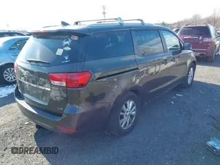 2017 Kia Sedona LX with VIN KNDMB5C19H6336297, listed as a IAAI auction lot 41396475 with Not Provided miles and . Bid and sale history available at DreamBid. Image 4.