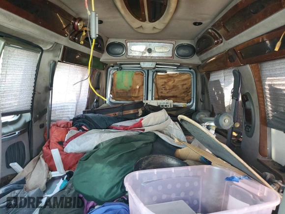 2000 Ford Econoline Cargo Recreational with VIN 1FDRE14L5YHA56690, listed as a Copart auction lot 58926155 with 162,797 mi miles and Salvage title. Bid and sale history available at DreamBid. Image 10.