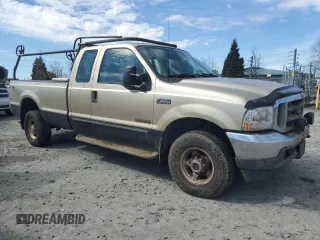2000 Ford F-250 XL with VIN 1FTNX21F1YEA83615, listed as a Copart auction lot 49978775 with 198,382 mi miles and Salvage title. Bid and sale history available at DreamBid. Image 4.
