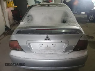 2006 Mitsubishi Lancer with VIN JA3AJ66F46U057530, listed as a Copart auction lot 87750605 with 180,243 mi miles and Salvage Title. Bid and sale history available at DreamBid. Image 6.