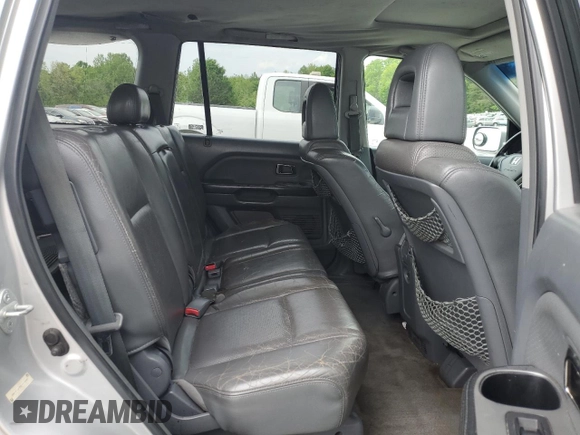 2005 Honda Pilot EX-L z VIN 2HKYF18735H570447, wystawiony jako Copart lot #53534485 z przebiegiem 339 522 mil mil oraz Szkoda całkowita • Salvage title. Historia ofert i sprzedaży dostępna na DreamBid. Obrazek 11.