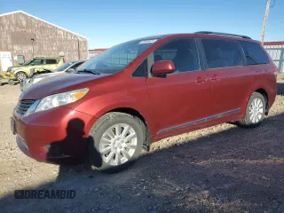 2014 Toyota Sienna LE with VIN 5TDJK3DC5ES075494, listed as a Copart auction lot 82048634 with 151,216 mi miles and Salvage Title. Bid and sale history available at DreamBid. Image 1.