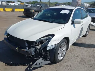 2010 Nissan Altima 3.5 SR with VIN 1N4BL2AP0AN501388, listed as a IAAI auction lot 42040501 with 161,185 mi miles. Bid and sale history available at carsss.com. Image 2.