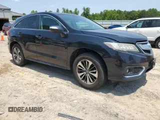 2016 Acura RDX Advance with VIN 5J8TB4H71GL018663, listed as a Copart auction lot 59438725 with 156,167 mi miles and Salvage title. Bid and sale history available at DreamBid. Image 4.