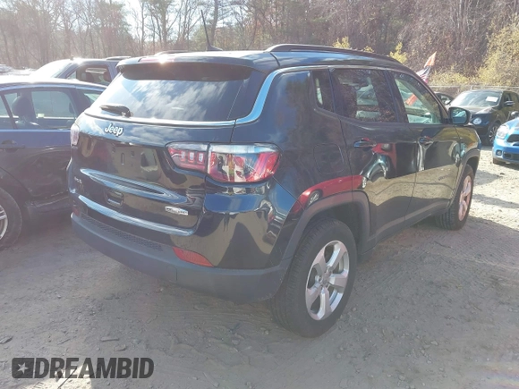 2019 Jeep Compass Latitude with VIN 3C4NJDBB6KT593734, listed as a IAAI auction lot 40871646 with 84,197 mi miles and . Bid and sale history available at DreamBid. Image 4.