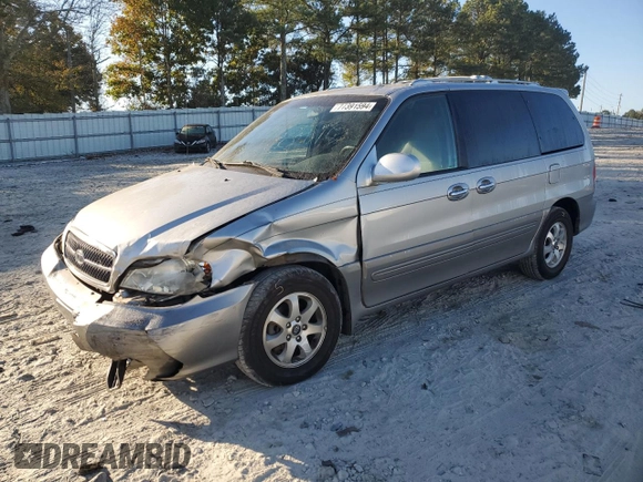 2004 Kia Sedona LX with VIN KNDUP131346508490, listed as a Copart auction lot 77391594 with 41,211 mi miles and Salvage Title. Bid and sale history available at carsss.com. Image 1.