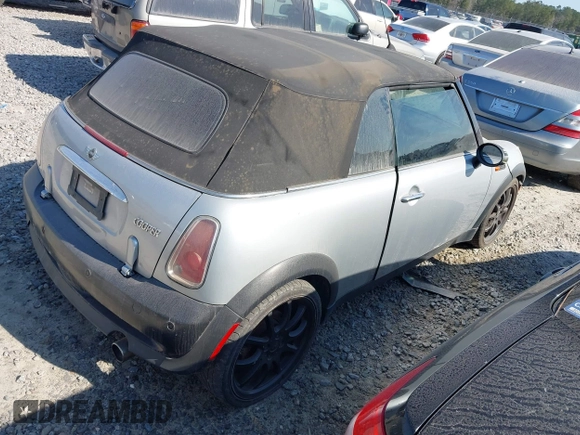 2006 MINI Convertible with VIN WMWRF33586TF64534, listed as a IAAI auction lot 41484453 with 180,748 mi miles and . Bid and sale history available at DreamBid. Image 4.