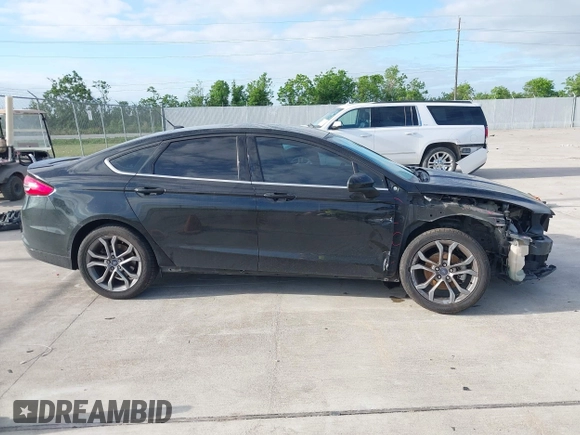 2017 Ford Fusion S with VIN 3FA6P0G75HR353909, listed as a IAAI auction lot 42024272 with 151,383 mi miles. Bid and sale history available at carsss.com. Image 14.