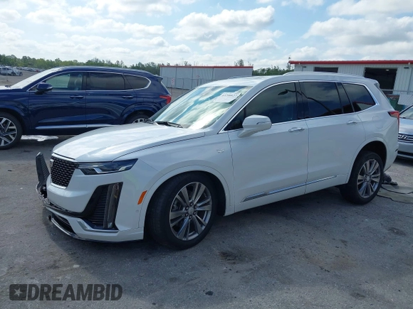 2023 Cadillac XT6 FWD Premium Luxury with VIN 1GYKPCRS3PZ186210, listed as a IAAI auction lot 42290027 with 44,117 mi miles and . Bid and sale history available at DreamBid. Image 2.