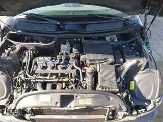 2002 MINI Hardtop with VIN WMWRC33402TC32985, listed as a IAAI auction lot 42608636 with 159,996 mi miles and . Bid and sale history available at DreamBid. Image 10.