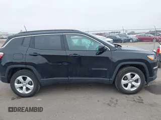 2018 Jeep Compass Altitude with VIN 3C4NJDBB9JT202297, listed as a IAAI auction lot 42020996 with 59,461 mi miles and . Bid and sale history available at DreamBid. Image 13.