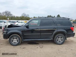 2003 Toyota Sequoia Limited with VIN 5TDBT48A23S164548, listed as a IAAI auction lot 41716216 with 224,658 mi miles. Bid and sale history available at carsss.com. Image 14.