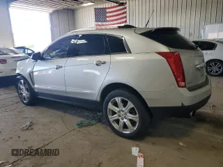 2014 Cadillac SRX Performance Collection with VIN 3GYFNFE30ES680042, listed as a Copart auction lot 56765445 with 91,174 mi miles and Non repairable. Bid and sale history available at DreamBid. Image 2.