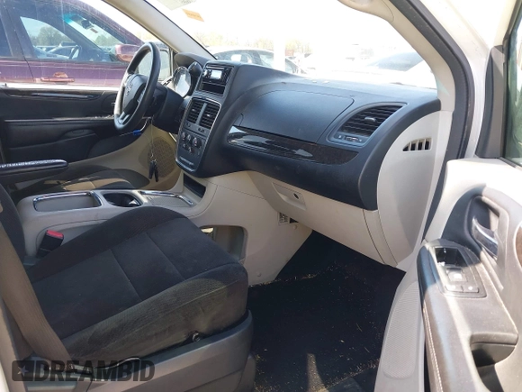 2013 Dodge Grand Caravan SXT with VIN 2C4RDGCG2DR522136, listed as a IAAI auction lot 42023561 with 176,635 mi miles and . Bid and sale history available at DreamBid. Image 5.