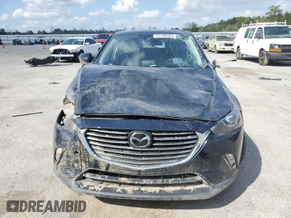 2018 Mazda CX-3 Grand Touring z VIN JM1DKFD79J0329416, wystawiony jako Copart lot #51708325 z przebiegiem 64 597 mil mil oraz Szkody całkowita. Historia ofert i sprzedaży dostępna na DreamBid. Obrazek 5.