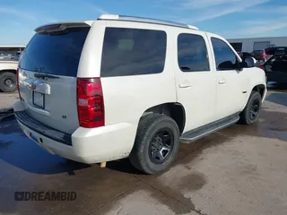 2012 Chevrolet Tahoe Commercial with VIN 1GNLC2E0XCR185593, listed as a IAAI auction lot 41217784 with 150,419 mi miles and . Bid and sale history available at DreamBid. Image 4.