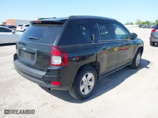2014 Jeep Compass Sport with VIN 1C4NJCBA6ED630812, listed as a IAAI auction lot 42026664 with 134,445 mi miles. Bid and sale history available at carsss.com. Image 4.