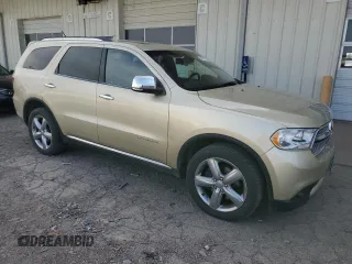 2012 Dodge Durango Citadel with VIN 1C4SDJET2CC181286, listed as a Copart auction lot 52671705 with 214,895 mi miles and Salvage title. Bid and sale history available at DreamBid. Image 4.