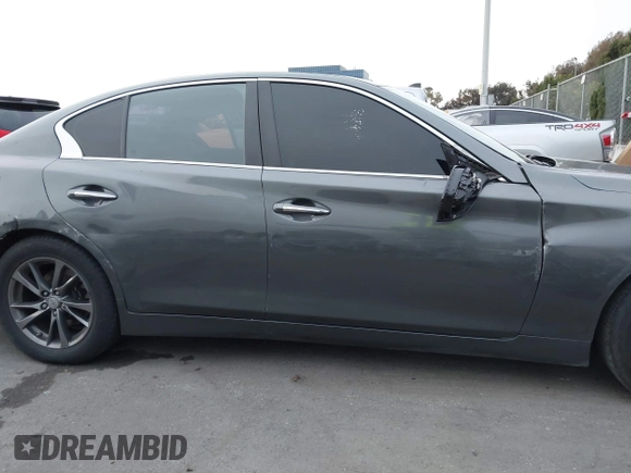 2015 Infiniti Q50 Premium with VIN JN1BV7AP1FM355875, listed as a IAAI auction lot 41777679 with 100,827 mi miles. Bid and sale history available at carsss.com. Image 14.
