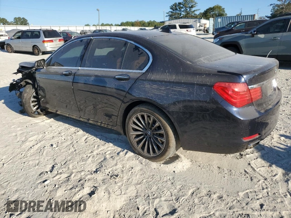 2011 BMW 7 Series 740i with VIN WBAKA4C51BC612629, listed as a Copart auction lot 77372234 with 164,471 mi miles and Salvage Title. Bid and sale history available at carsss.com. Image 2.