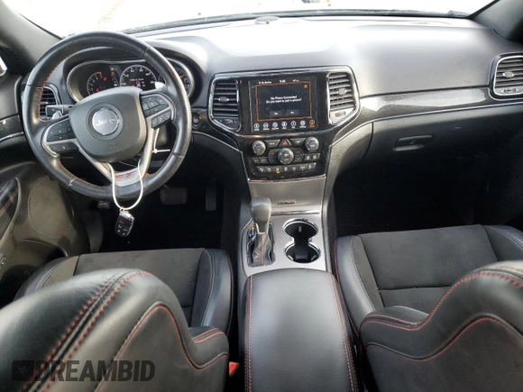 2021 Jeep Grand Cherokee Trailhawk with VIN 1C4RJFLG0MC525273, listed as a Copart auction lot 49632275 with 57,452 mi miles and Salvage title. Bid and sale history available at DreamBid. Image 8.