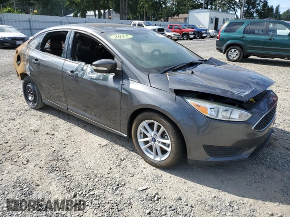 2017 Ford Focus SE with VIN 1FADP3F23HL244619, listed as a Copart auction lot 61057515 with Not provided miles and Salvage title. Bid and sale history available at DreamBid. Image 4.