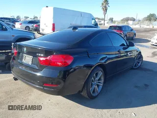 2014 BMW 4 Series 428i with VIN WBA3N7C55EK221259, listed as a IAAI auction lot 41322781 with 100,274 mi miles and . Bid and sale history available at carsss.com. Image 4.