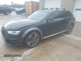 2013 Audi allroad Premium Plus with VIN WA1UFAFL0DA091224, listed as a IAAI auction lot 41679816 with 105,601 mi miles. Bid and sale history available at carsss.com. Image 2.