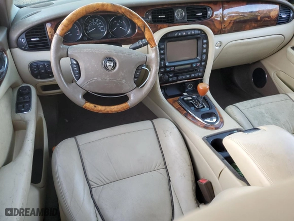 2007 Jaguar XJ with VIN SAJWA79B37SH18598, listed as a Copart auction lot 76253764 with 0 mi miles and Salvage Title. Bid and sale history available at carsss.com. Image 8.